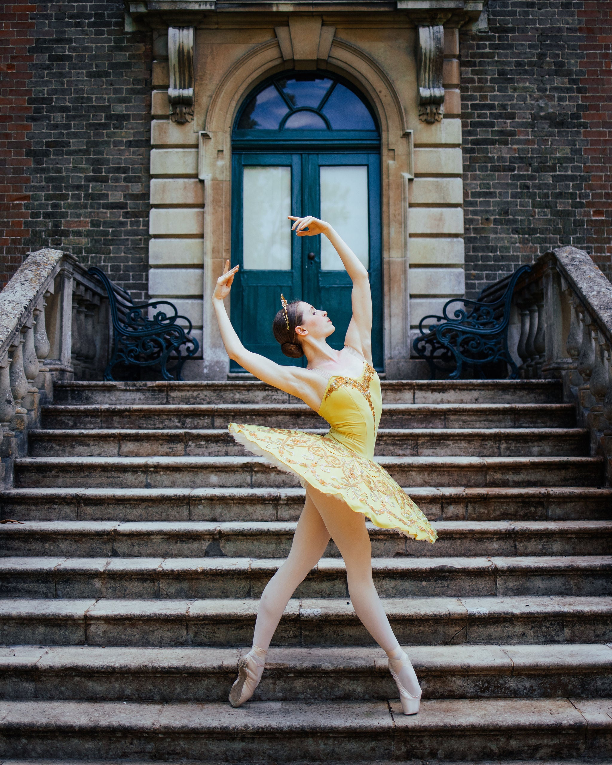 a ballet dancer dressed in a golden yellow tutu 640+ Yellow Tutu Dress Stock Photos, Pictures & Royalty-Free Images